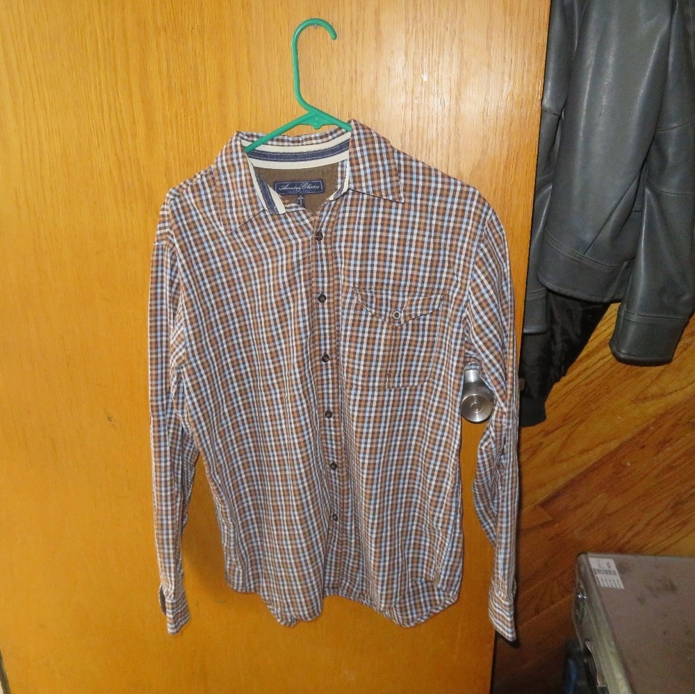 Button down cream, blue and white shirt.